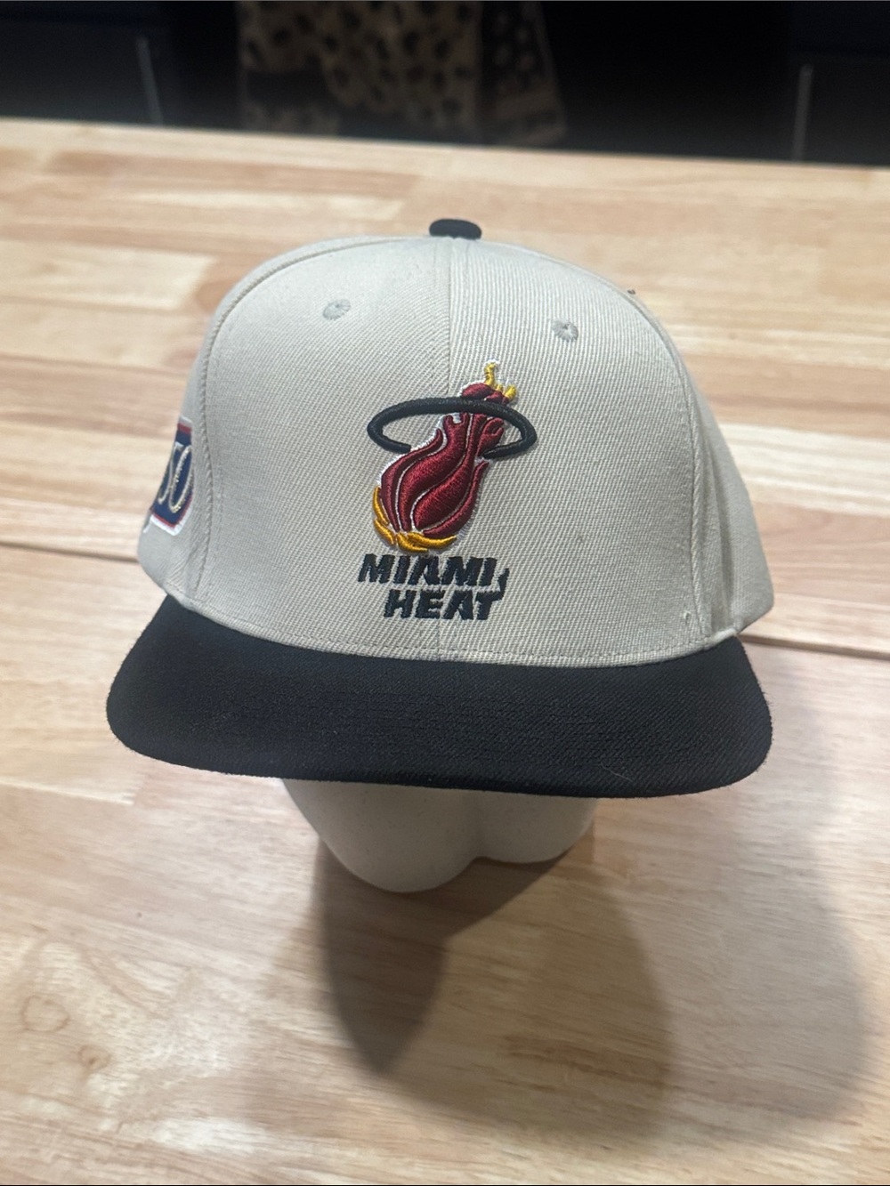 Mitchell & Ness White and Black Snapback with Green Undervisor
